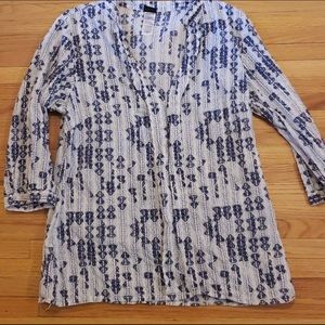 100% cotton - tag says 12, but it fits like a 10 but would also fit an 8 IMO.